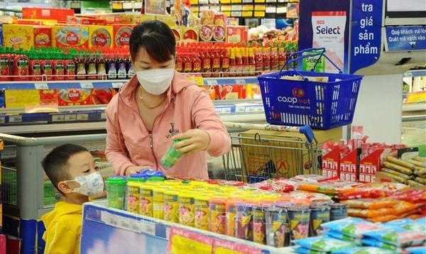 Shoppers at a supermarket (Photo: VNA) Shoppers at a supermarket (Photo: VNA)