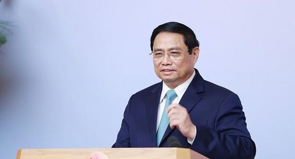Prime Minister Pham Minh Chinh speaks at the meeting. (Photo: VNA)