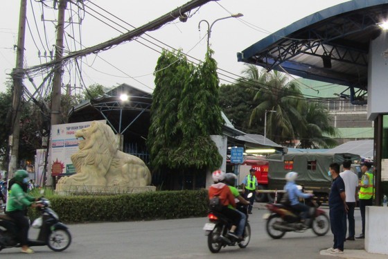 The workers and employees of Tan Hiep Phat Beverage Group get to work as ordinary days at the company’s head office on April 11