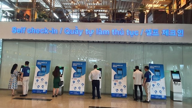 Self-check-in kiosks for passengers of Korean Air at Da Nang International Airport. Photo cand.com.vn Self-check-in kiosks for passengers of Korean Air at Da Nang International Airport. Photo cand.com.vn