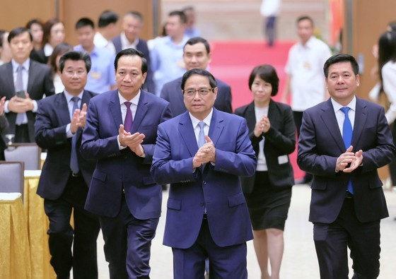 Prime Minister Pham Minh Chinh meets the FDI business community on October 16 morning. (Photo: Viet Chung)