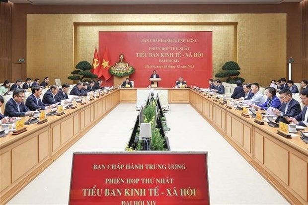 The first meeting of the 14th National Party Congress subcommittee for socioeconomic affairs takes place in Hanoi on December 8. (Photo: VNA) 14th-national-party-congress-socioeconomic-subcommittee-meets-1-7953.jpg