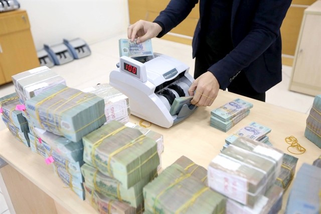 Credit growth at credit institutions in HCMC in November was among the highest in the year. (Photo: VNA) credit-4342.jpg