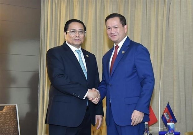 PM Pham Minh Chinh (L) and his Cambodian counterpart Hun Manet (Photo: VNA) cambodia-9735.jpg