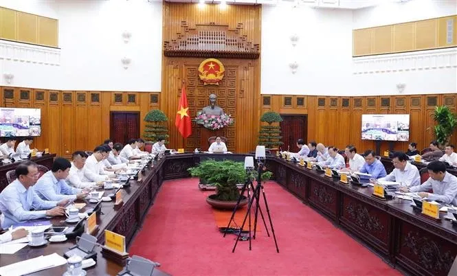 PM Pham Minh Chinh chairs a meeting with ministries, sectors and localities on power supply in 2024. (Photo: VNA) PM.jpg