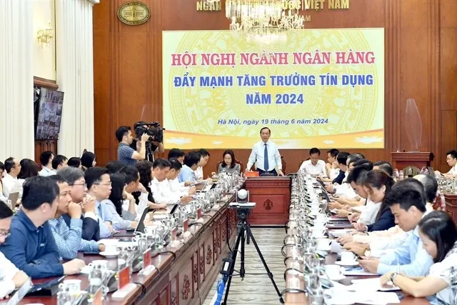 The State Bank of Vietnam organizes a sector-wide online conference on promoting bank credit growth for the year on June 19. (Photo courtesy of SBV) bank.jpg