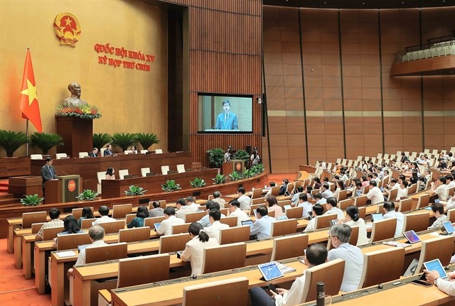 Lawmakers are discussing some specil mechanisms and policies for developing the private economic sector and creating breakthroughs in law making and enforcement on May 16. (Photo: VNA) 423979_5165546890640788_nlnt.jpg