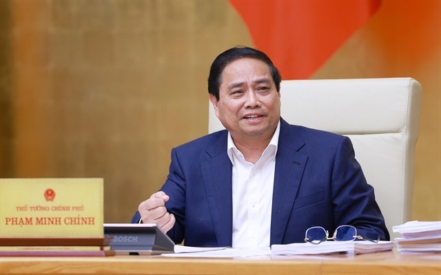 PM Pham Minh Chinh addresses the Government’s law-building session for May on Thursday. (Photo: VNA) 425605_Original (25).jpg