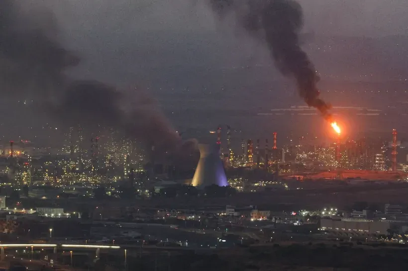 Smoke rises following an explosion in the port city of Haifa, Israel, on June 16, 2025. 475506-1164.jpg