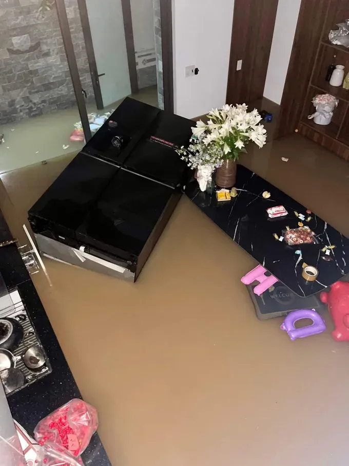 Flooding has submerged homes, damaging residents' belongings and properties. img-9833-949-4508.jpeg
