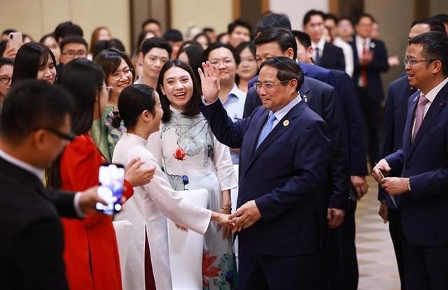 Nearly a quarter of the Vietnamese community in China are academics. 432948_5201172563658643_dhs.jpg