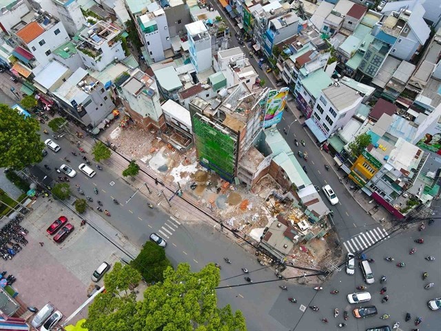 Aerial view of cleared land and ongoing demolition at the site of Ho Chi Minh City's Metro Line 2 project (Photo: thesaigontimes.vn) duc.jpg