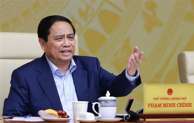 Prime Minister Pham Minh Chinh at the national online conference on July 16. (Photo: VNA) thu-tuong-pham-minh-chinh-chu-tri-hoi-nghi-chinh-phu-voi-dia-phuong-ve-kich-ban-tang-truong-kinh-te-nam-2025-anh-ttxvn.jpg