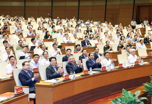 General Secretary To Lam and delegates attend the conference at the main venue, National Assembly House, Hanoi. 450367_5272461095948676_vna_potal_hoi_nghi_toan_quoc_quan_triet_trien_khai_thuc_hien_cac_nghi_quyet_so_59_70_71_va_72_cua_bo_chinh_tri__8277162.jpg