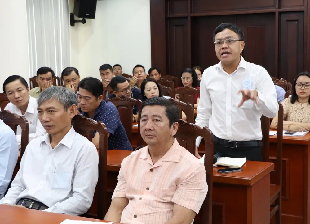 Đại diện doanh nghiệp nêu ý kiến tại hội nghị