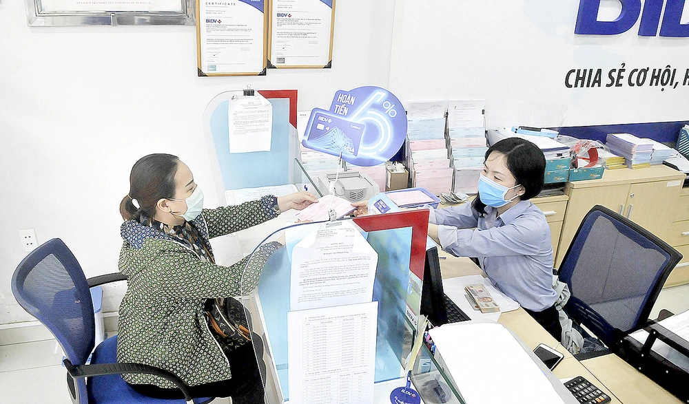 Vì sao lãi suất vay chưa giảm? ảnh 2 Vì sao lãi suất vay chưa giảm? ảnh 2
