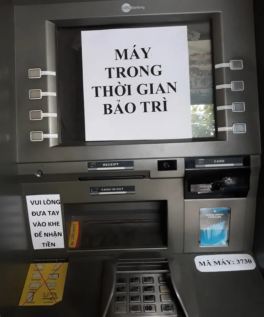 Chật vật đi rút tiền ATM ảnh 1 Chật vật đi rút tiền ATM ảnh 1