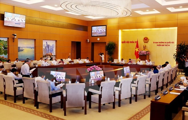 第十四屆國會常務委員會第14次會議昨(14)日下午繼續在會場工作，並對《網絡安全法》草案提意見。（圖源：阮民/越通社）