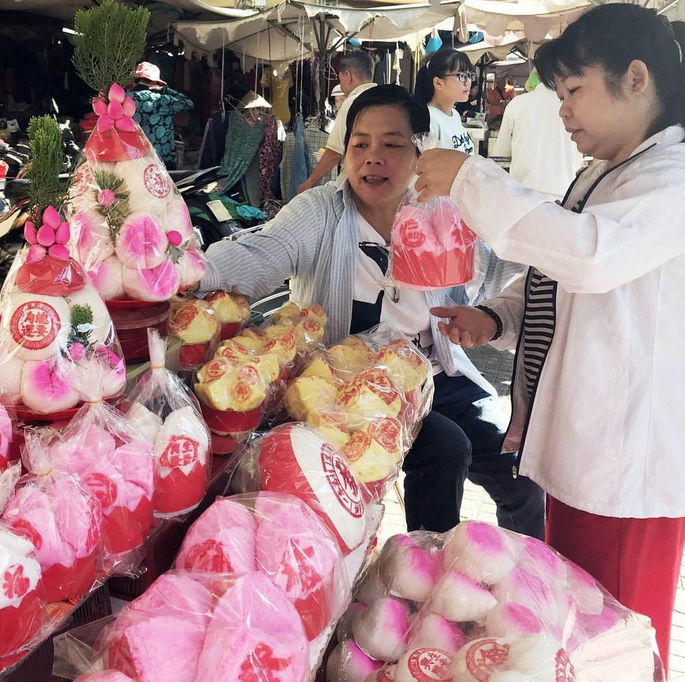 年節傳統食品寓意吉祥 ảnh 3