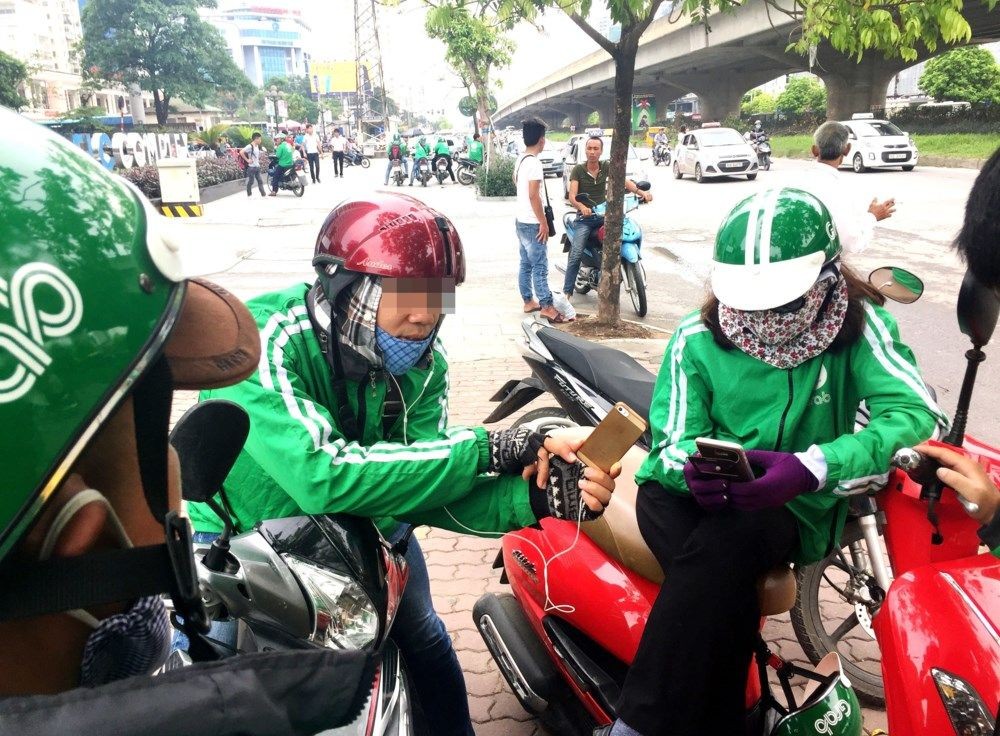 網約摩托車司機在接訂單。(示意圖源:互聯網)
