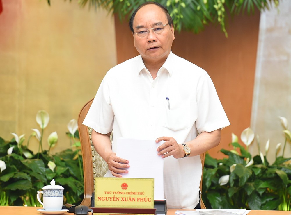 政府總理阮春福主持會議並發表講話。(圖源:光孝)