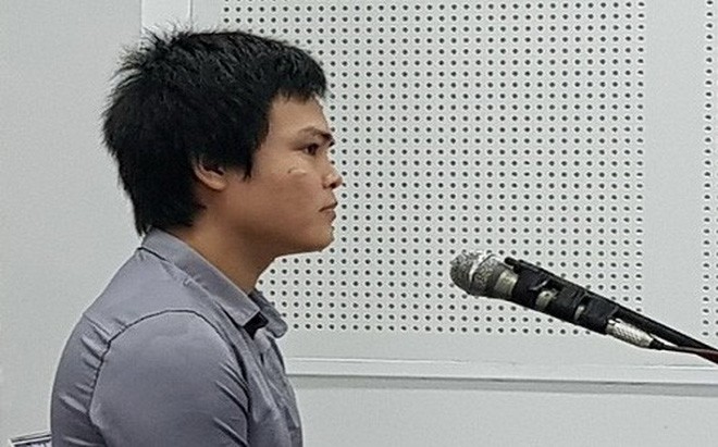 出庭受審的被告人潘武靈答法官問案。（圖源：公理報）