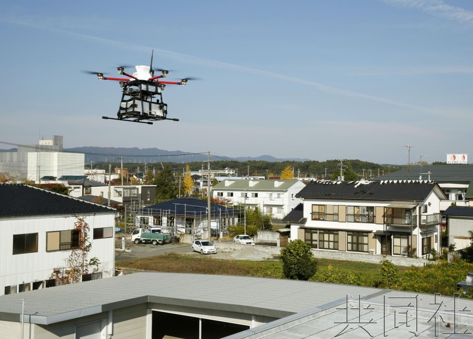 日福島嘗試小型無人機貨物配送。（圖源：共同社）