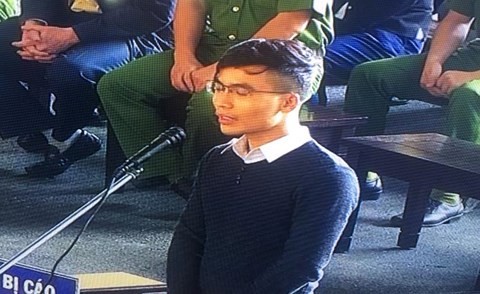 被告人武明光在法庭上答法官問案。（圖源：PV）