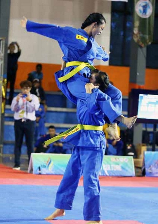 女子拳套對練賽項比賽一瞥。