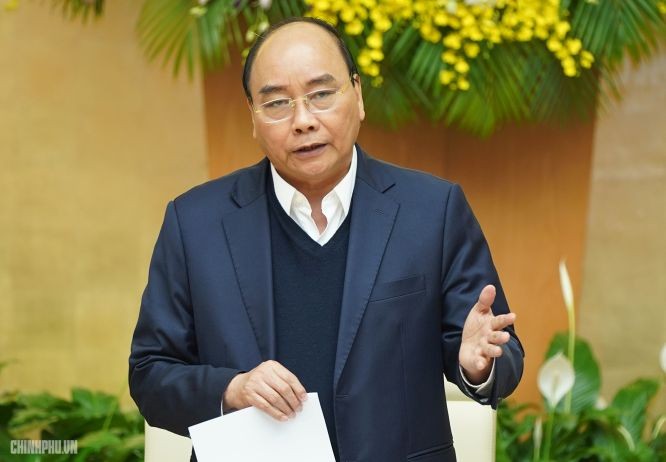 政府總理阮春福在會議上致詞。(圖源:光孝)