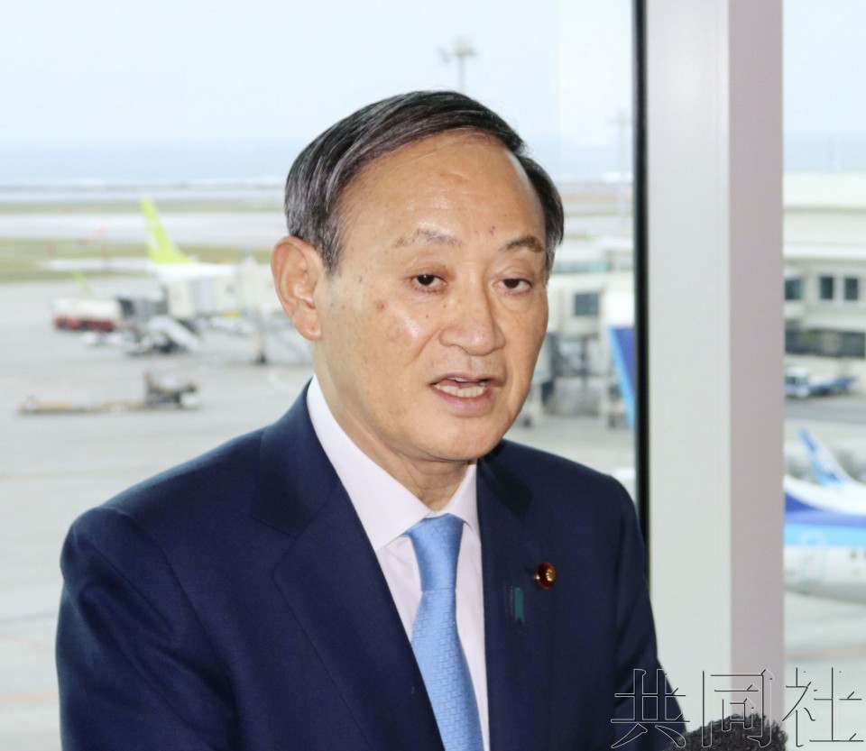 日本內閣官房長官菅義偉。(圖源:共同社)