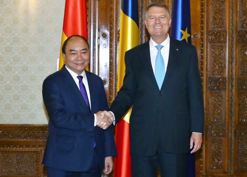 政府總理阮春福會見羅馬尼亞總統克勞斯‧約翰尼斯。（圖源：VGP）