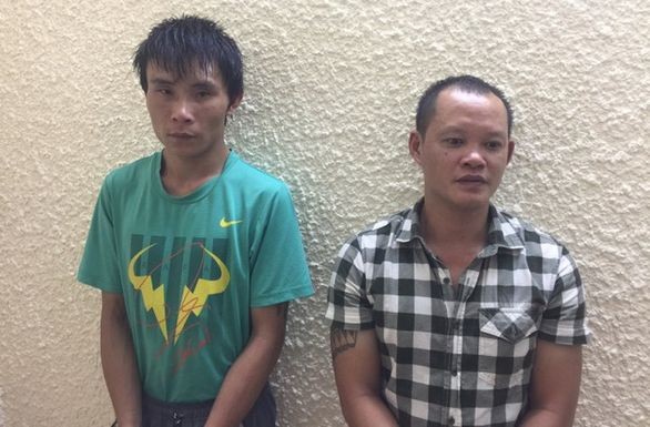 涉嫌搶劫犯罪的2名嫌疑人鄧友林(左)和楊文新。(圖源:夏玲)