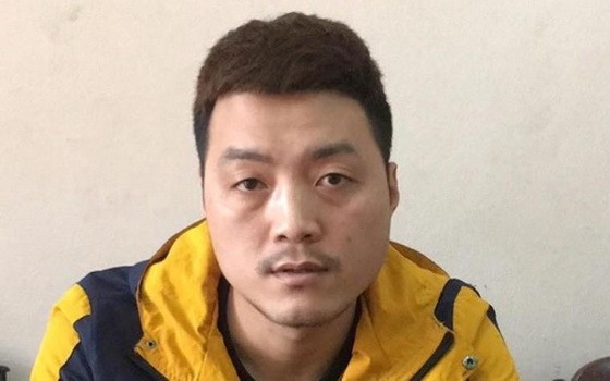 投案自首的通緝犯梁文秀。（圖源：警方提供）