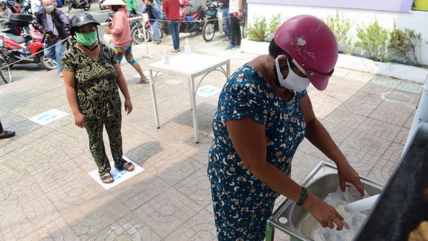 疫情期間送暖──“自動提米機” ảnh 1