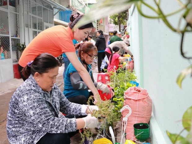 華人婦女周雪蓉 家庭事業兼顧 ảnh 1