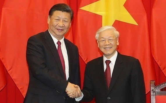 黨中央總書記、國家主席阮富仲（右）與中共中央總書記、國家主席習近平。（圖源：越通社）