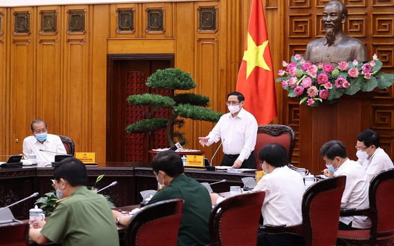 政府總理范明政主持會議。(圖源:越通社)