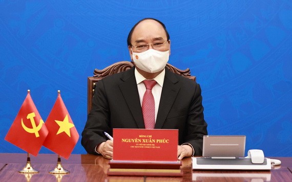 國家主席阮春福與中國國家主席習近平通電話。(圖源:越通社)