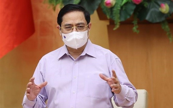 政府總理范明政主持會議並發表講話。（圖源：越通社）