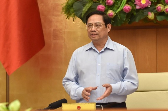 政府總理范明政主持會議。（圖源：VGP）