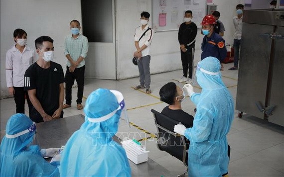 新冠病毒採樣檢測。（圖源：越通社）