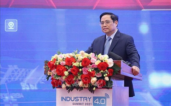 政府總理范明政在會議上發表講話。 (圖:越通社)