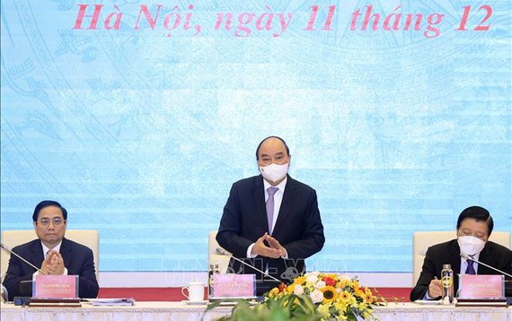 國家主席阮春福、政府總理范明政主持研討會。(圖:VOV)