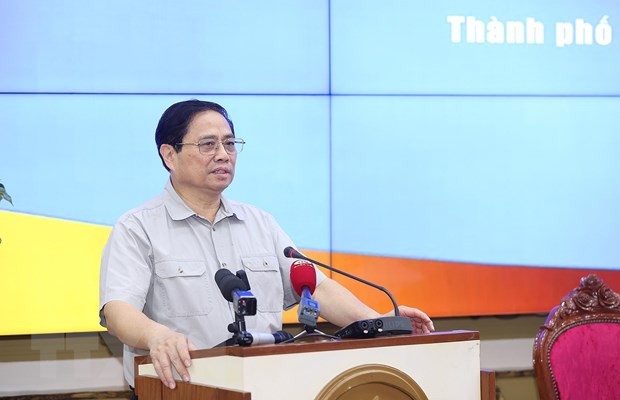 政府总理范明政在会议上发表讲话。(图:越通社)
