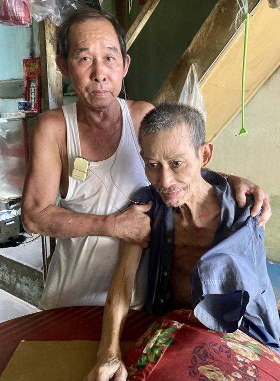 梁平池(左)和梁全。