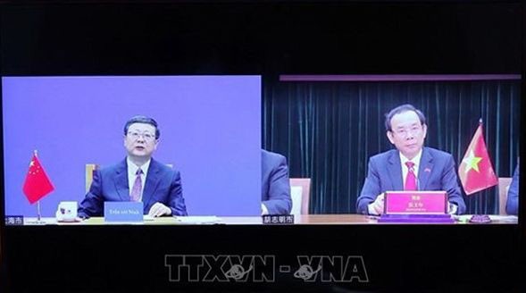 胡志明市市委书记阮文年已与中国共产党中央政治局委员、上海市委书记陈吉宁举行视频会议。(图:越通社)