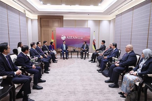 政府总理范明政会见文莱达鲁萨兰国苏丹。（图：越通社）