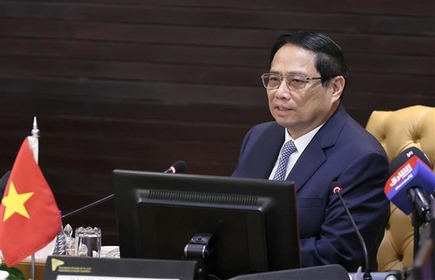 政府总理范明政发表讲话。（图：越通社）