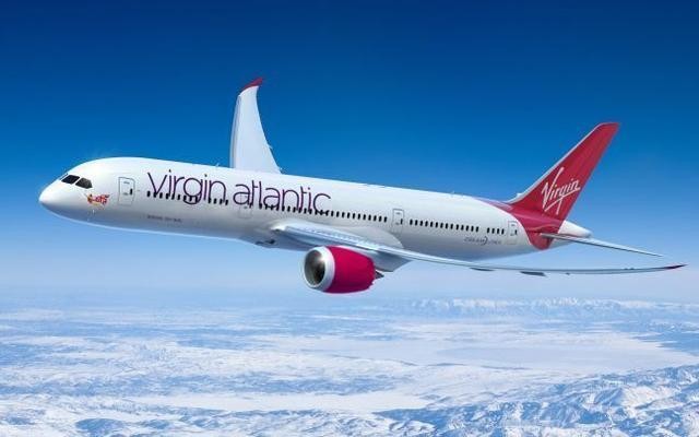 维珍航空的一架客机正在空中飞翔。(图:互联网)